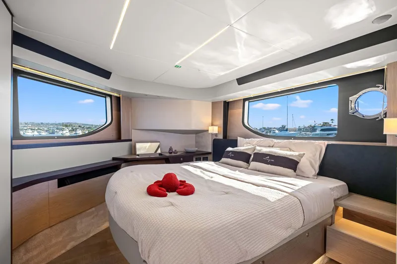Slide: The Image of Luxurious bedroom interior of 2026 Absolute 48 Coupe yacht with scenic window views. - 27