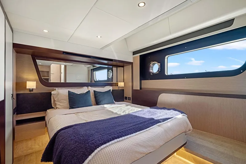 Slide: The Image of Luxurious bedroom interior of 2026 Absolute 48 Coupe yacht with modern design. - 37