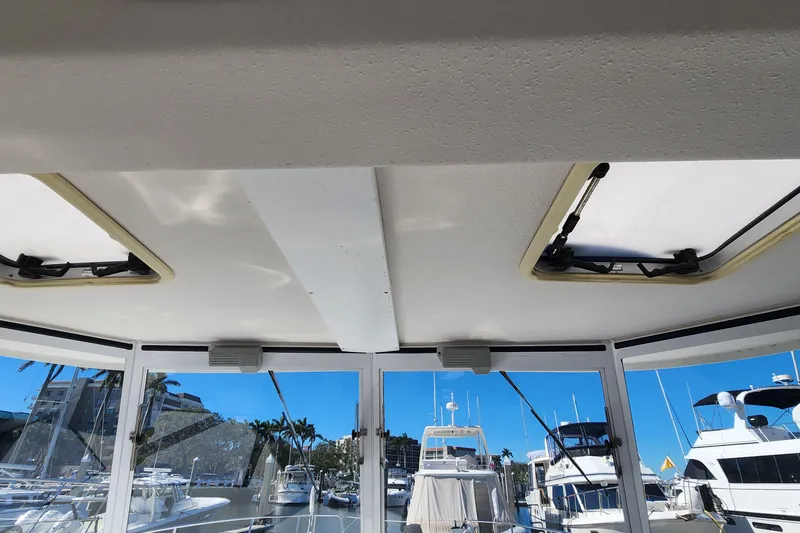 Slide: The Image of Interior view of 2003 Endeavour 36 TrawlerCat with marina backdrop. - 25