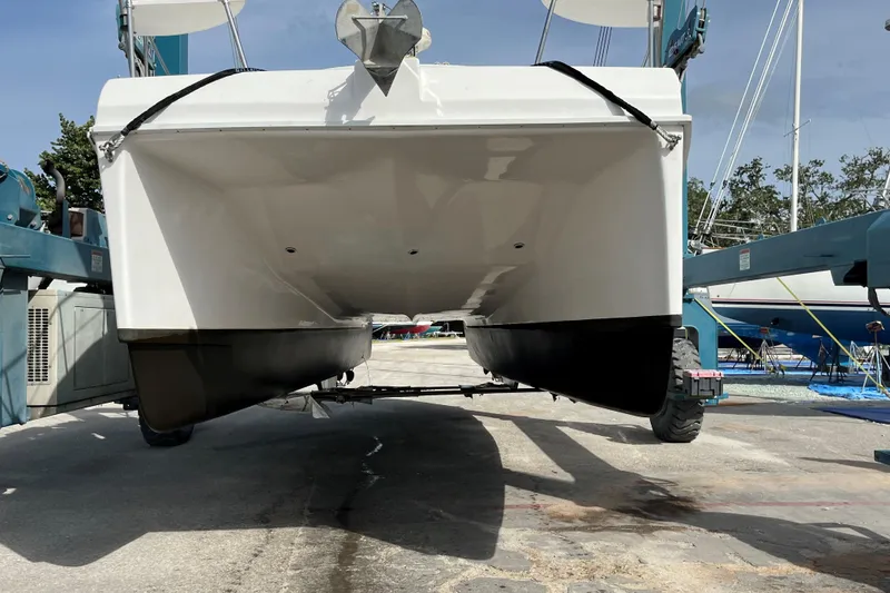 Slide: The Image of 2003 Endeavour 36 TrawlerCat catamaran in dry dock, viewed from below. - 28