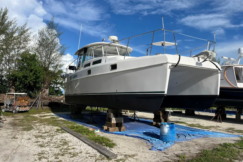 Slide: The Image of 2003 Endeavour 36 TrawlerCat on land, under clear blue sky. - 29