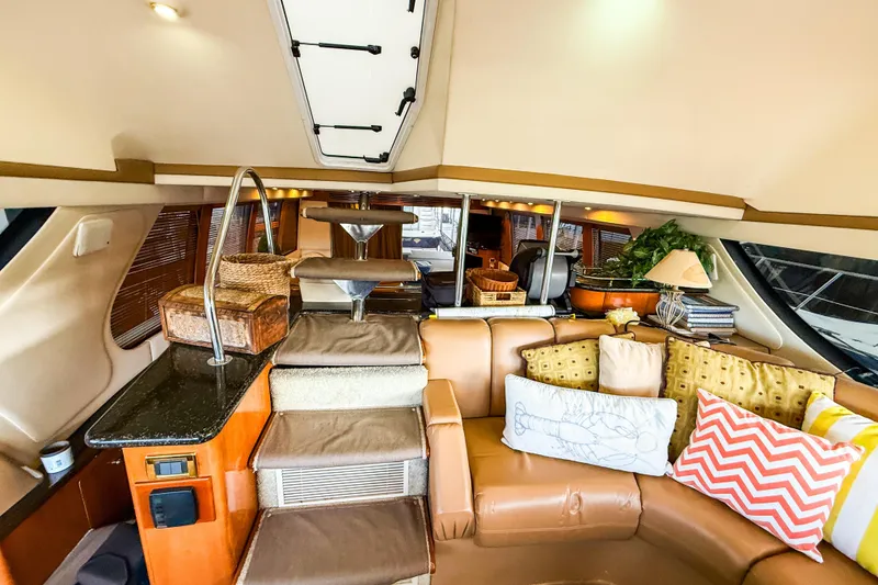 Slide: The Image of Luxurious interior of 2001 Carver 570 Voyager Pilothouse with plush seating and elegant decor. - 30