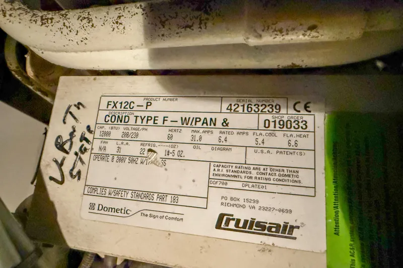 Slide: The Image of Label on a Cruisair unit in a 2001 Carver 570 Voyager Pilothouse boat. - 43