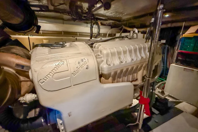 Slide: The Image of Engine room of 2001 Carver 570 Voyager Pilothouse with Cummins Marine engine. - 45