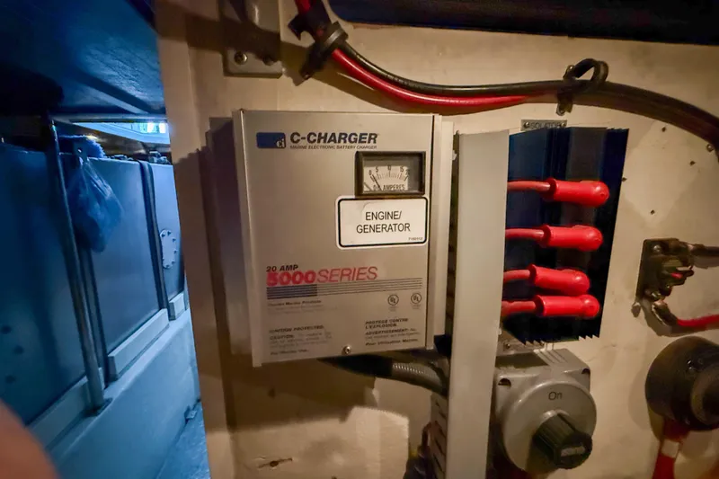 Slide: The Image of Engine room of 2001 Carver 570 Voyager Pilothouse with C-Charger and wiring. - 47