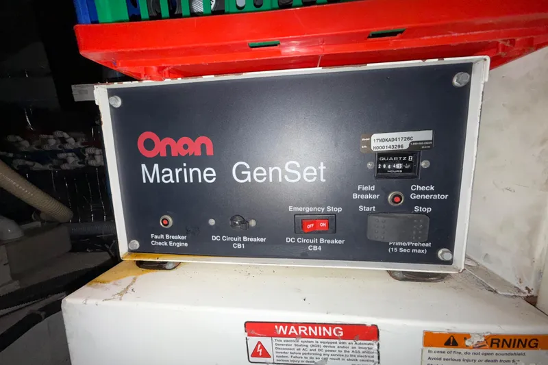 Slide: The Image of Onan Marine GenSet control panel on 2001 Carver 570 Voyager Pilothouse. - 53