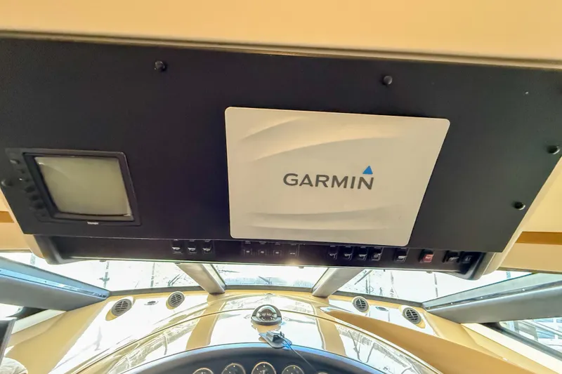 Slide: The Image of Garmin navigation system in 2001 Carver 570 Voyager Pilothouse cockpit. - 31