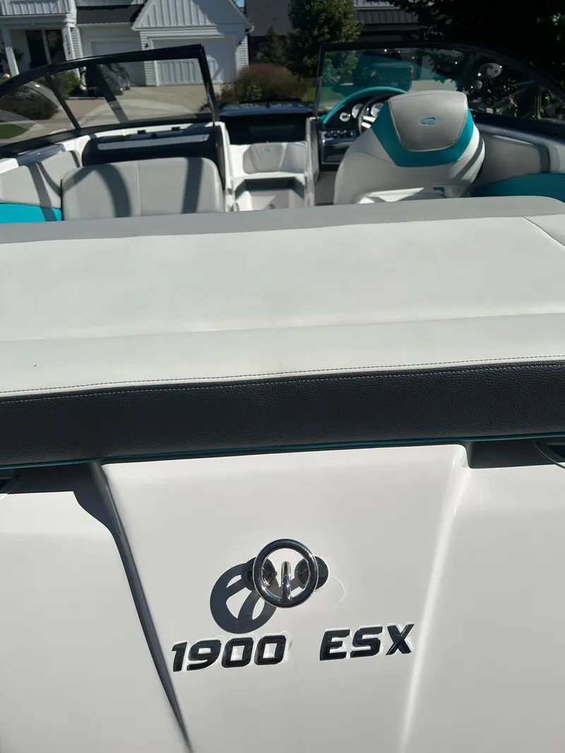 Slide: The Image of 2021 Regal 1900 ES Bowrider boat interior with logo and seating. - 18