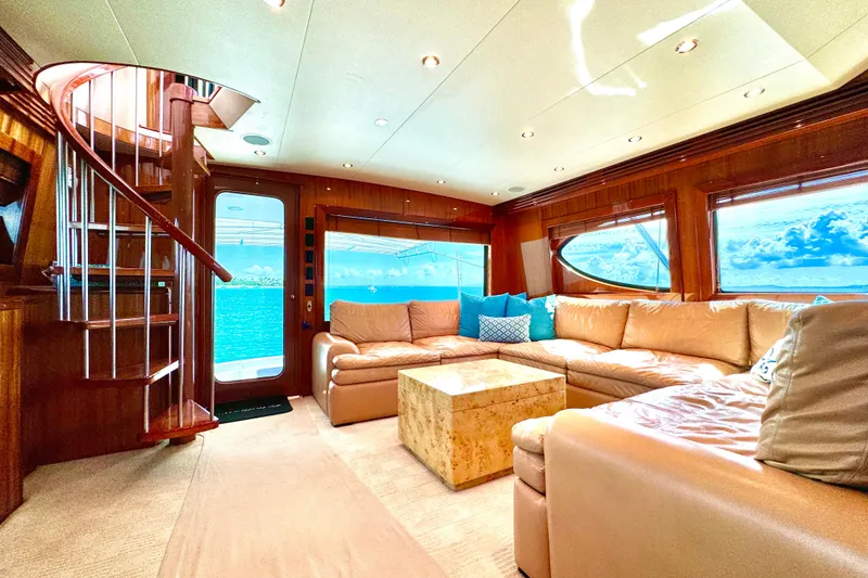 Slide: The Image of Luxurious interior of 2008 Hatteras 64 Convertible yacht with plush seating and ocean view. - 11