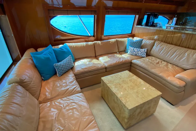 Slide: The Image of Luxurious interior of 2008 Hatteras 64 Convertible yacht with leather seating and ocean view. - 14