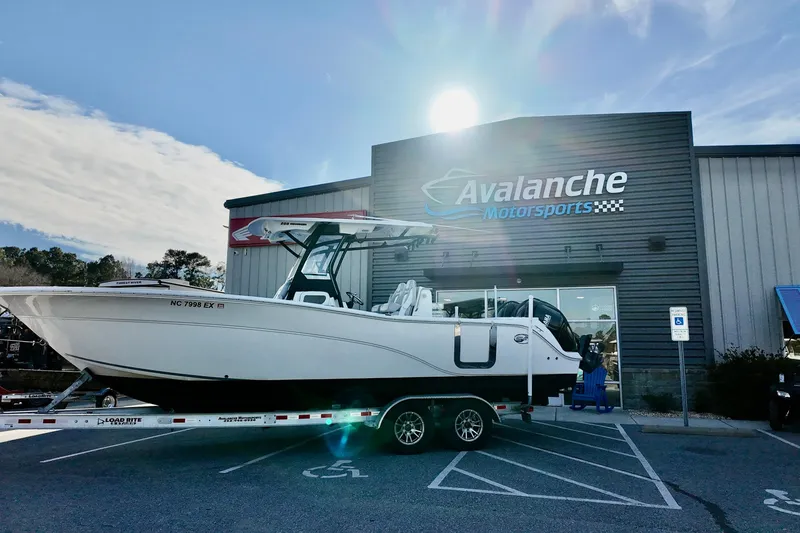 The Image of 2022 Sea Fox 288 Commander boat on trailer outside Avalanche Motorsports building. - 0