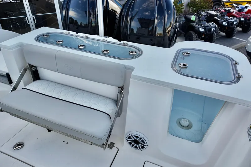 Slide: The Image of 2022 Sea Fox 288 Commander boat interior with seating and storage compartments. - 11
