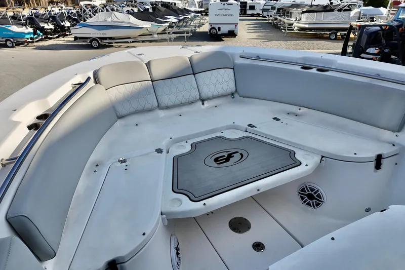 Slide: The Image of 2022 Sea Fox 288 Commander boat interior with spacious seating and sleek design. - 16