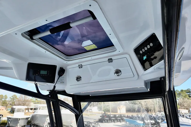 Slide: The Image of Interior view of 2022 Sea Fox 288 Commander boat's control panel and hatch. - 18