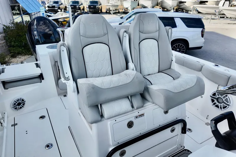 Slide: The Image of 2022 Sea Fox 288 Commander boat with luxurious white and gray seating. - 20
