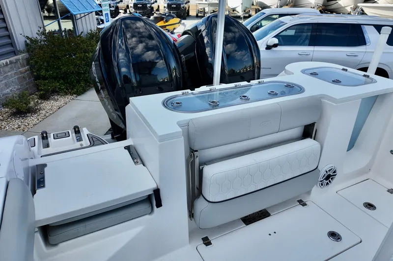 Slide: The Image of 2022 Sea Fox 288 Commander boat with dual engines and sleek white seating. - 23