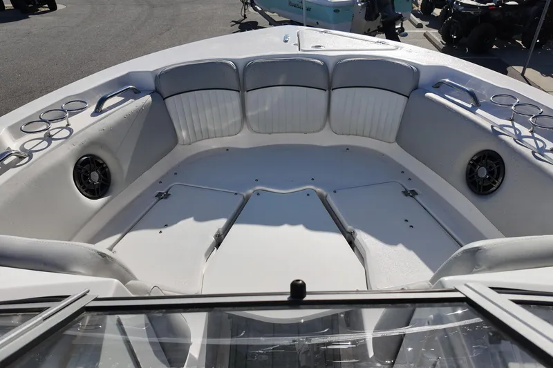 Slide: The Image of 2024 Sea Fox 228 Traveler boat interior with seating and cup holders. - 10