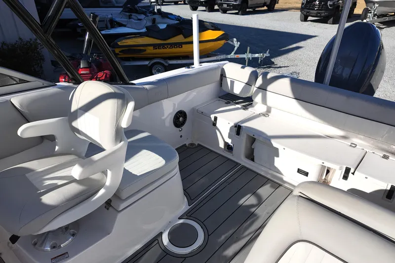 Slide: The Image of 2024 Sea Fox 228 Traveler boat interior with seating and storage compartments. - 12