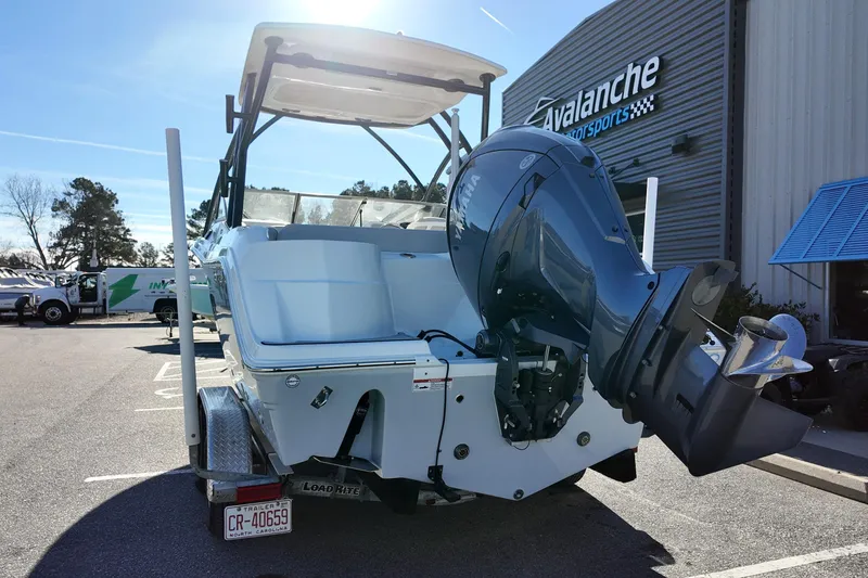 Slide: The Image of 2024 Sea Fox 228 Traveler boat with Yamaha outboard motor at dealership. - 4