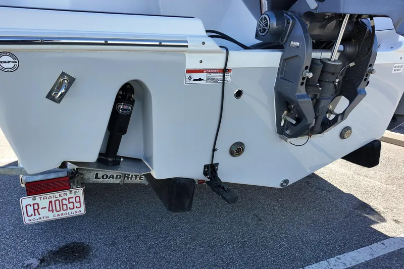 Slide: The Image of 2024 Sea Fox 228 Traveler boat rear view with North Carolina trailer plate. - 5
