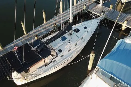 Slide: The Image of Aerial view of 1999 Caliber 40LRC sailboat docked at a marina. - 2