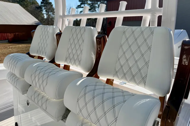 Slide: The Image of 2023 Sportsman Open 352 Center Console with luxurious diamond-stitched seating. - 14