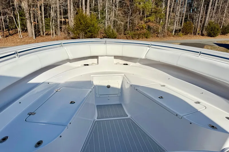 Slide: The Image of 2023 Sportsman Open 352 Center Console boat interior with spacious seating and storage. - 18