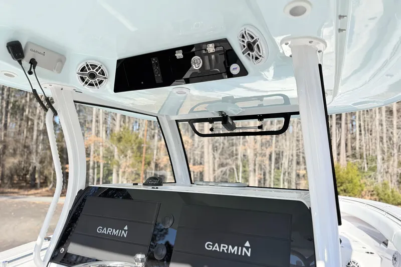 Slide: The Image of 2023 Sportsman Open 352 Center Console with Garmin electronics and overhead speakers. - 26