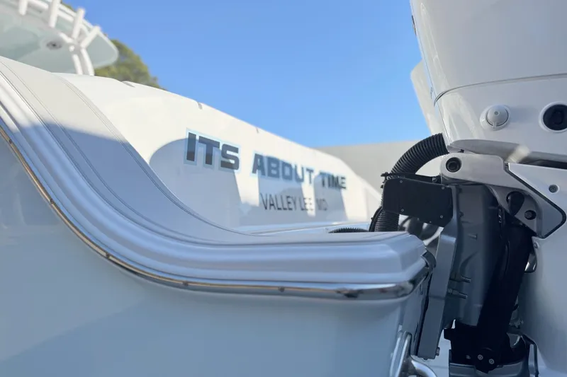 Slide: The Image of 2023 Sportsman Open 352 Center Console boat with "ITS ABOUT TIME" text on the side. - 27