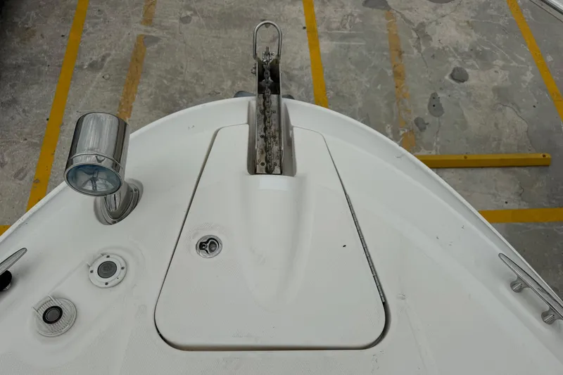 Slide: The Image of Bow of 2013 Sea Ray Sundancer 310 with anchor and deck fittings. - 26