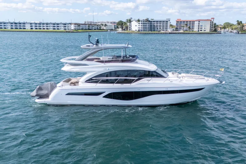 The Image of Luxurious 2022 Princess F62 yacht cruising on serene blue waters. - 0