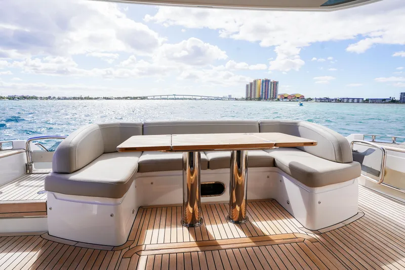 Slide: The Image of Luxurious 2022 Princess F62 yacht deck with seating and ocean view. - 10
