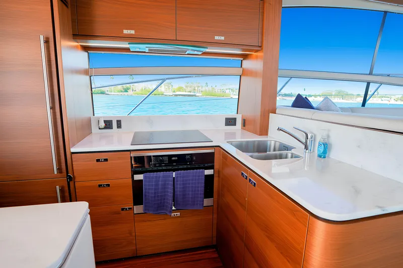 Slide: The Image of Luxurious 2022 Princess F62 yacht kitchen with modern appliances and scenic ocean view. - 20