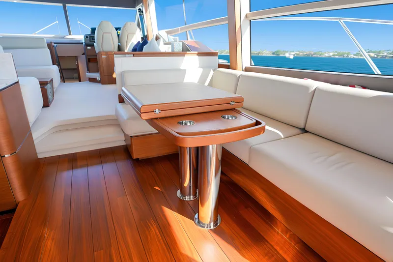 Slide: The Image of Luxurious interior of 2022 Princess F62 yacht with elegant seating and wooden flooring. - 22