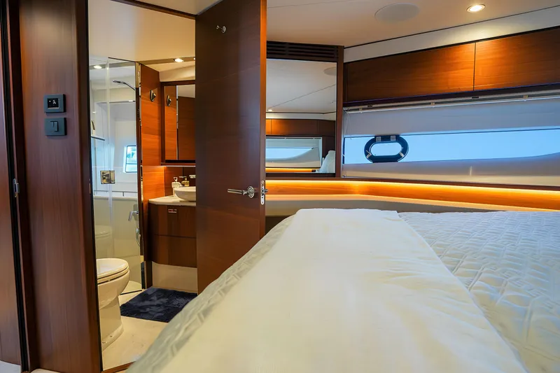 Slide: The Image of Luxurious interior of 2022 Princess F62 yacht with elegant bedroom and ensuite bathroom. - 42