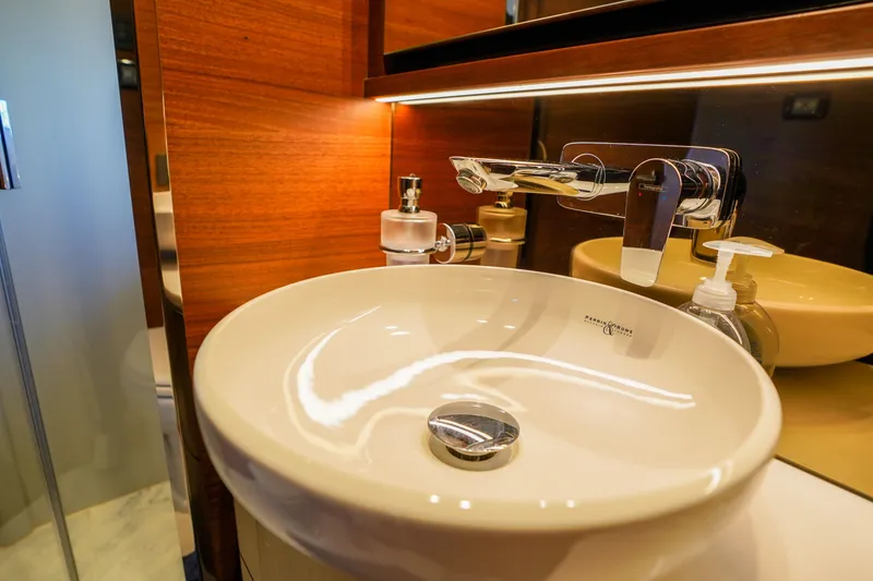Slide: The Image of Luxurious bathroom sink in 2022 Princess F62 yacht, featuring modern fixtures and elegant design. - 45