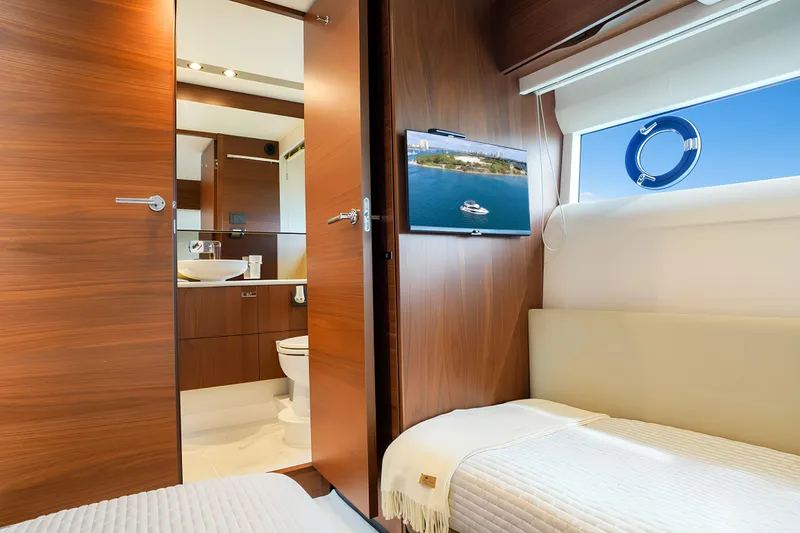 Slide: The Image of Luxurious interior of 2022 Princess F62 yacht with modern bathroom and cozy cabin. - 47