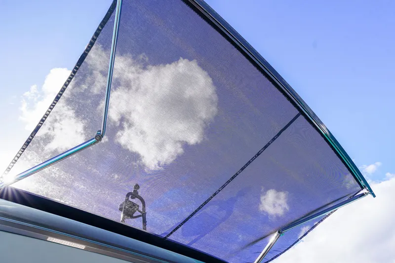 Slide: The Image of Sunshade on 2022 Princess F62 yacht against blue sky and clouds. - 57