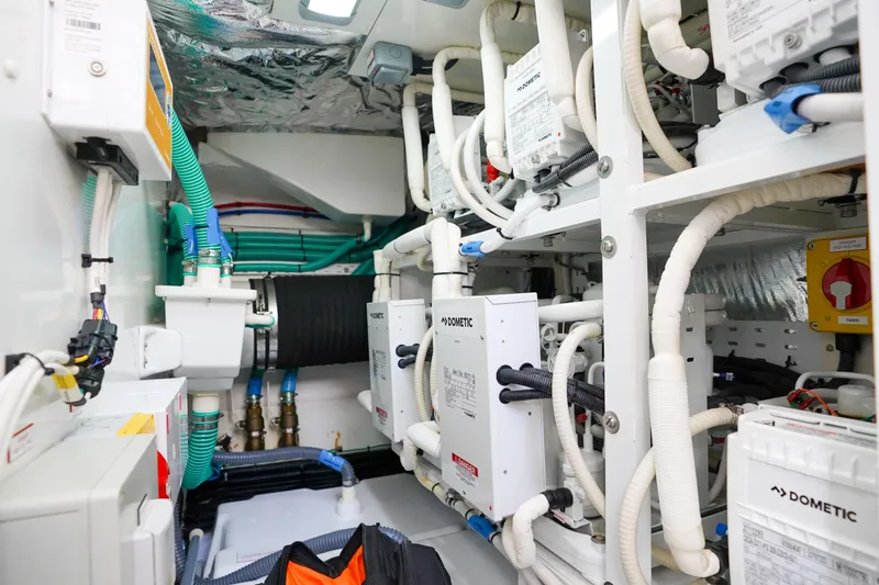 Slide: The Image of Engine room of 2022 Princess F62 yacht with complex piping and equipment. - 59