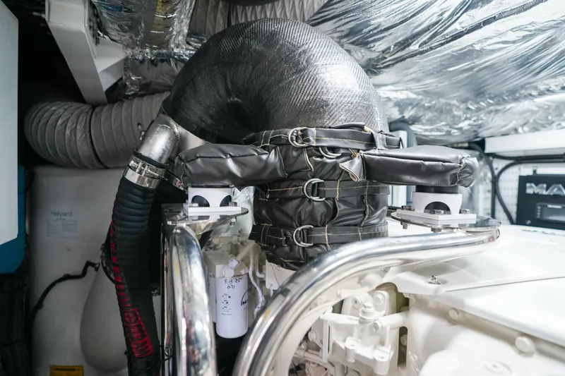 Slide: The Image of Engine room of 2022 Princess F62 yacht with insulated exhaust system. - 61