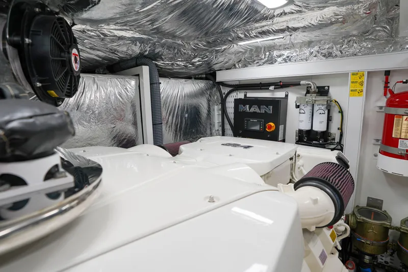 Slide: The Image of Engine room of 2022 Princess F62 yacht with MAN components and fire safety equipment. - 62