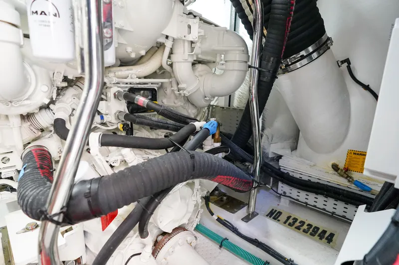 Slide: The Image of Engine room of 2022 Princess F62 yacht with complex piping and machinery. - 63