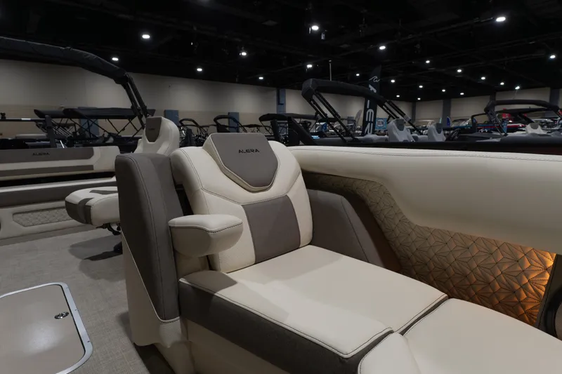 Slide: The Image of Luxurious interior of 2026 Alera M23Q boat with elegant seating and ambient lighting. - 14