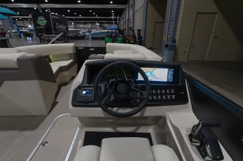 Slide: The Image of Interior view of 2026 Alera M23Q boat with modern dashboard and navigation system. - 11
