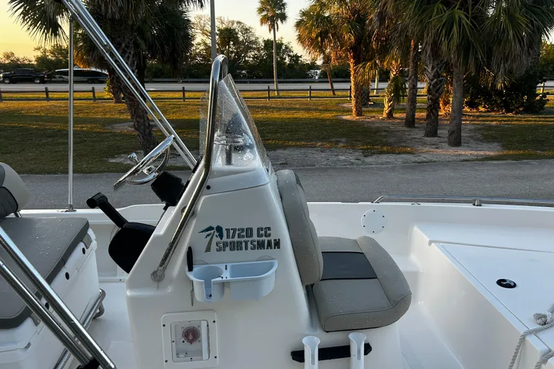 Slide: The Image of 2025 Key West 1720 Center Console boat with palm trees in the background. - 4