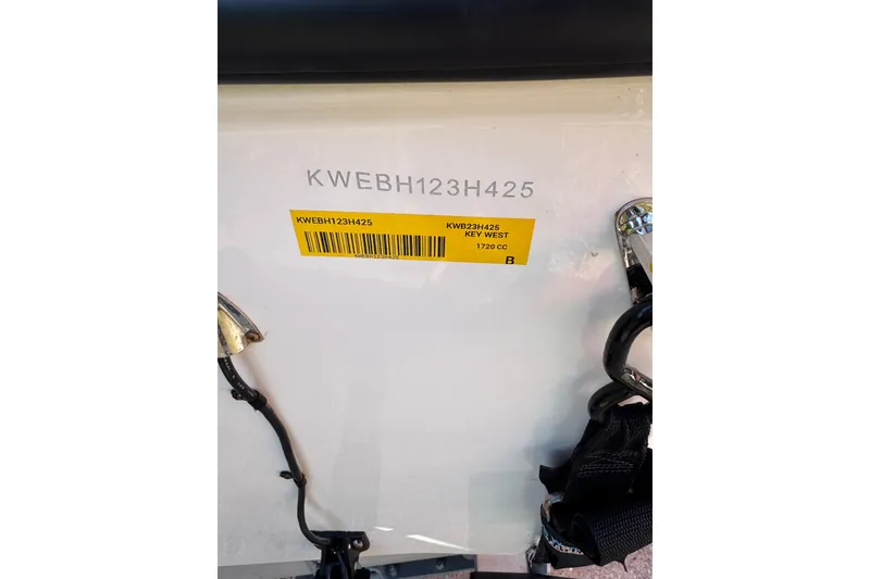 Slide: The Image of 2025 Key West 1720 Center Console boat with visible serial number and barcode. - 7