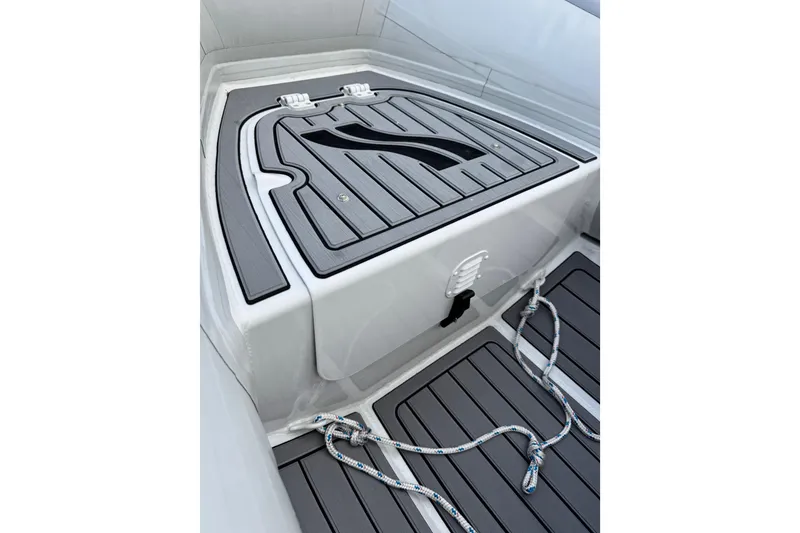 Slide: The Image of 2023 Highfield Classic 340 boat interior with sleek deck design and rope details. - 12