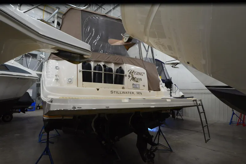 Slide: The Image of 2005 Rinker Fiesta Vee 342 boat in storage, rear view, Stillwater, MN. - 10