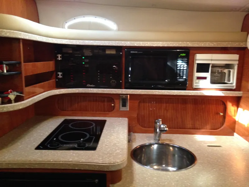 Slide: The Image of Galley kitchen in a 2005 Rinker Fiesta Vee 342 yacht. - 13