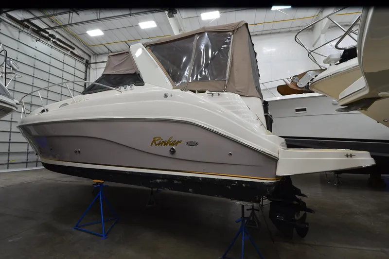 Slide: The Image of 2005 Rinker Fiesta Vee 342 boat in indoor storage, side view. - 3